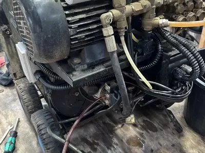 Fuel tank removed from Edge Panther pressure washer to allow cleaning of fuel lines and system during service.